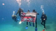 ESKİŞEHİRSPOR’UN ŞAMPİYONLUĞUNU DENİZİN 26 METRE ALTINDA KUTLADILAR